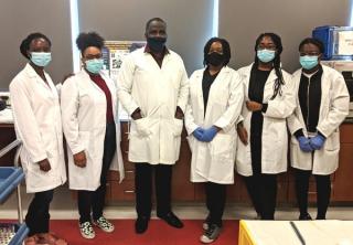 students in lab coats