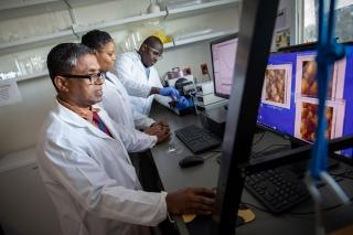 Coppin professors and student in the Center for Nanotechnology